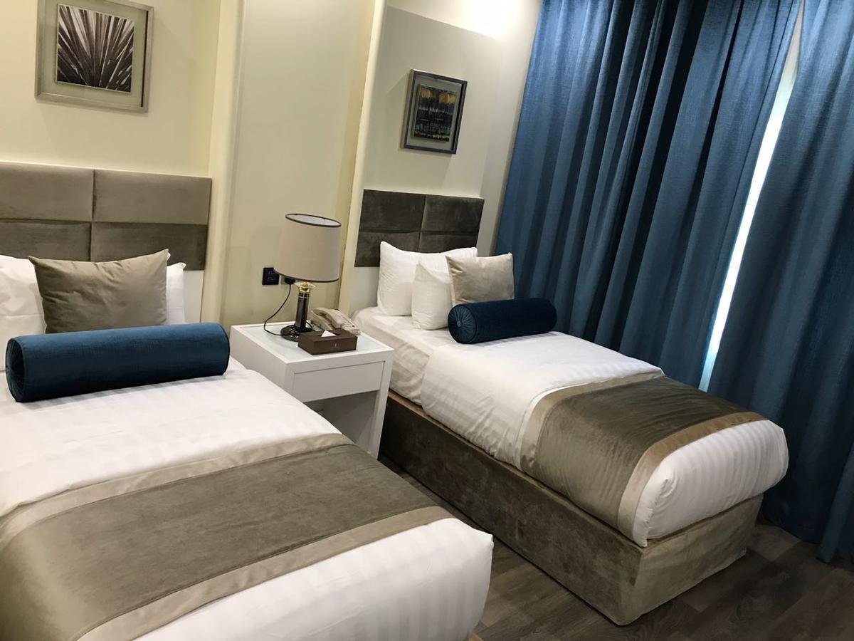 Golden Bujari Alulaya Hotel Ал Хубар Екстериор снимка